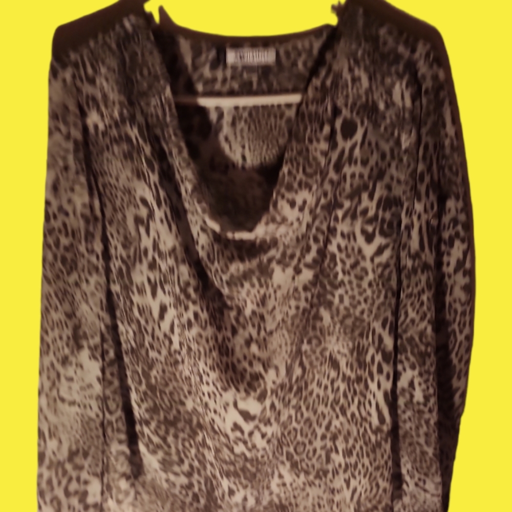 Jennifer Lopez Animal print blouse